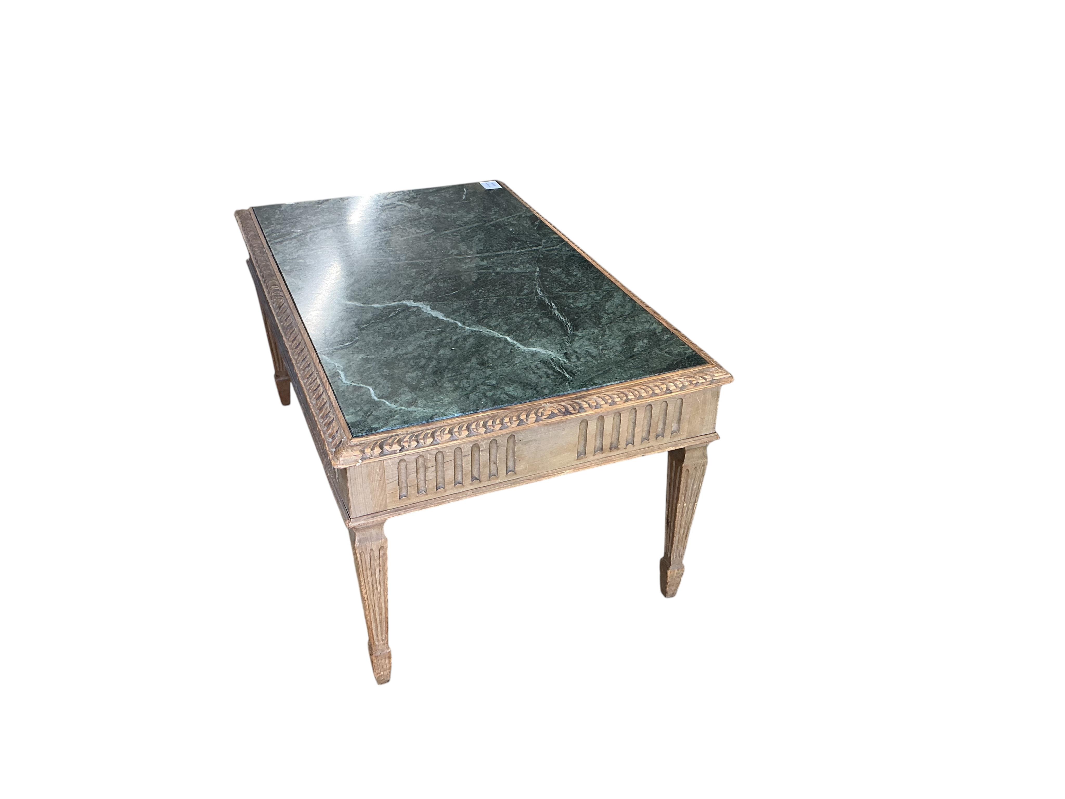 A rectangular marble top pine coffee table, width 81cm, depth 51cm, height 41cm